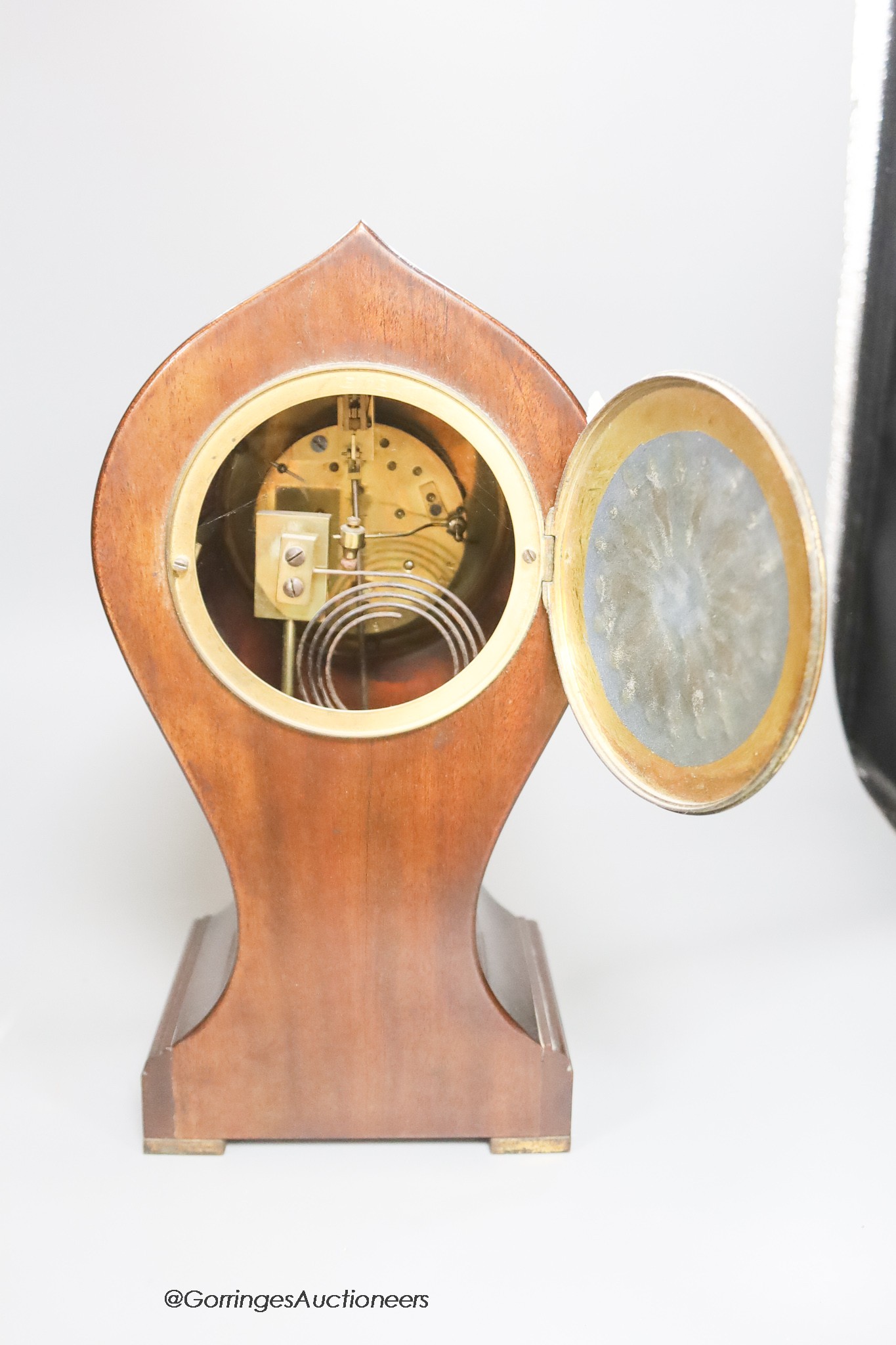 An Edwardian mahogany inlaid balloon mantel clock, height 35cm